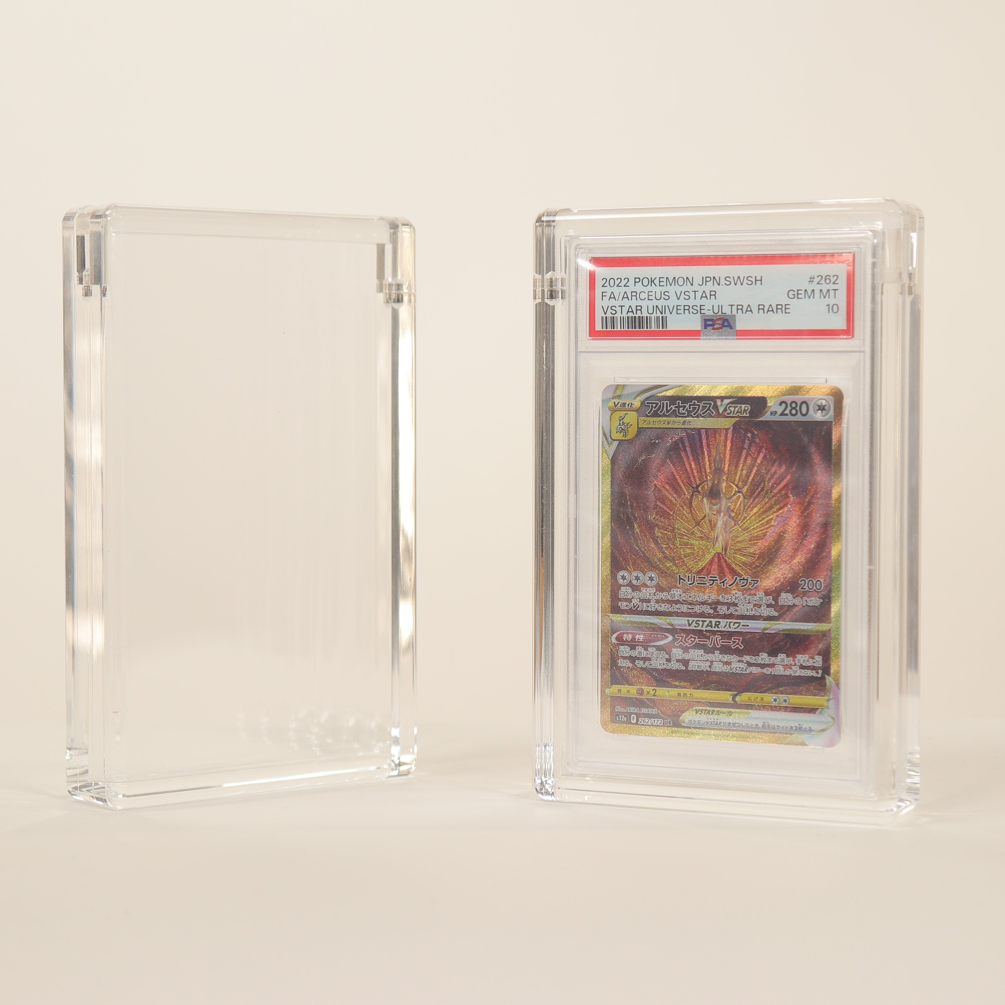 Trading card in a clear protective case on a light beige background